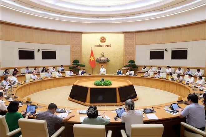 호 득 폭(Ho Duc Phoc) 부총리가 14일 국유기업 자본 구조조정 시행령 초안 논의를 위해 각 부처, 분야, 주요 국유기업 대표들과 실무 회의를 주재하고 있다. (사진: VNA)