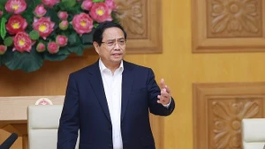 팜 민 찐 베트남 총리가 꽝쭝(Quang Trung) 캠페인 가속화 회의에서 발언하고 있다. (사진: VNA)