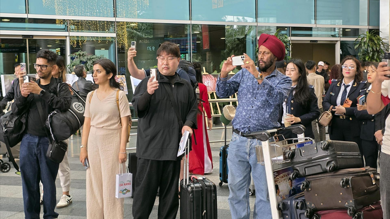 다낭국제공항에서 이동하는 승객들. (사진: VNA)