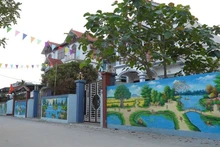 하노이 시골의 깨끗하고 아름다운 벽화길. (사진: 티엔 탐)