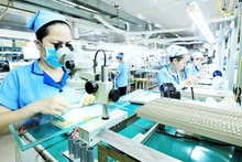 정밀 부품과 금형 및 전자 회로 기판을 전문으로 하는 일본 기업인 리듬베트남유한책임회사(하노이). 사진: 탄닷