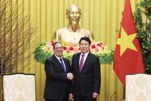 국가주석 루엉 꾸엉(오른쪽)과 브루노 로드리게스 파릴라 쿠바 정치국 위원 겸 외무장관 (사진: VNA)