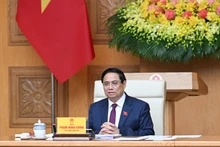 팜 민 찐 베트남 총리가 20일 하노이에서 열린 제14차 중앙 표창·포상위원회 회의에서 연설하고 있다. (사진: 찐 하이)