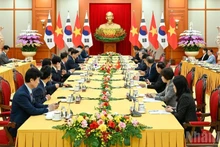 21일 하노이에서 열린 또 럼 베트남 공산당 서기장과 우원식 대한민국 국회의장의 회담 모습. (사진: NDO)